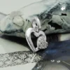 Anhänger 9x9mm kleines Herzchen mit Zirkonia auf einem offenen Herz 925 Silber